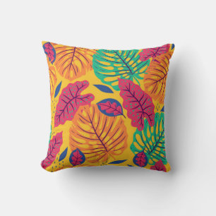 Seamless pattern with tropical leaves on yellow ba cushion