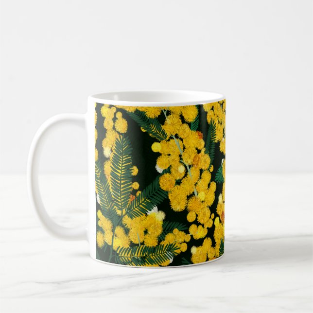 Seamless pattern with with yellow mimosa flowers a coffee mug (Left)