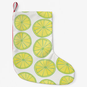 Seamless pattern with yellow lemon slices on white small christmas stocking