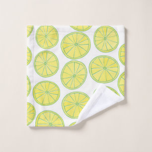 Seamless pattern with yellow lemon slices on white wash cloth