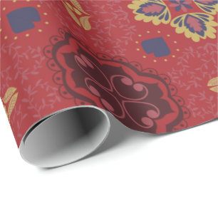 Seamless red pattern featuring ornate, symmetrical wrapping paper