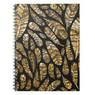 Seamless texture pattern of glowing golden feather notebook