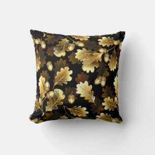 Seamless with golden oak branches on black cushion
