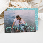 Seas and Greetings | Nautical Holiday Photo Card<br><div class="desc">Send holiday greetings to friends and family in nautical style with these coastal chic holiday photo cards. Design features your favourite photo with "seas and greetings" overlaid in vibrant aqua hand sketched lettering. Personalise with your names, custom greeting (shown with "Merry Christmas") and the year. Cards reverse to a white...</div>