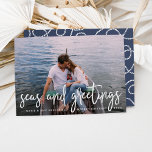 Seas and Greetings | Nautical Holiday Photo Card<br><div class="desc">Send holiday greetings to friends and family in nautical style with these coastal chic holiday photo cards. Design features your favourite photo with "seas and greetings" overlaid in crisp white hand sketched lettering. Personalise with your names, custom greeting (shown with "Merry Christmas") and the year. Cards reverse to a white...</div>
