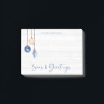 Seas and Greetings Seashell Ornament Coastal Wood Post-it Notes<br><div class="desc">Seas and Greetings Seashell Ornament on Coastal Wood Holiday Christmas notepad featuring ocean navy blue and sandy tan shell ornaments hanging from sailing jute rope on coastal shiplap wood with elegant typography. Add your name for a fun nautical holiday gift. Please contact us at cedarandstring@gmail.com if you need assistance with...</div>