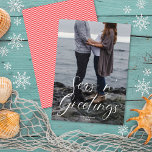 Seas n' Greetings Beach Script | Christmas Photo Holiday Card<br><div class="desc">This modern holiday photo card features elegant white calligraphy script over a full-bleed photo. The greeting on the front says "Seas n' Greetings" which makes it a perfect design for anyone looking for a beach or nautical theme. This design accommodates a single, vertical photo on the front of the card....</div>