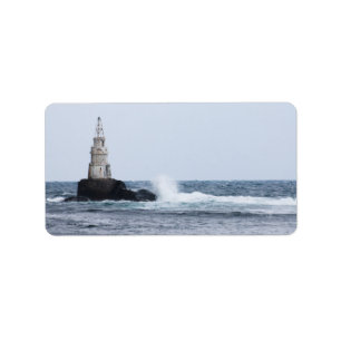 Seascape with lighthouse label