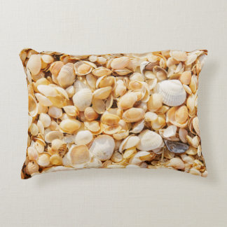 Seashell textured summer beach background. decorative cushion