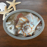 Seashells Monogrammed Coastal Beach Belt Buckle<br><div class="desc">A naturally beautiful photographic belt buckle featuring a creamy white and earthy orange natural seashell with personalised Monogram or Initials.
This is original beach photography by JLW_PHOTOGRAPHY.</div>