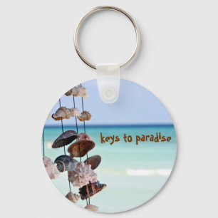 seashells on sea background key ring
