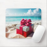Seashore Christmas Gift On Beach Sand Mouse Pad<br><div class="desc">A beautifully wrapped gift box with a vibrant red bow sits on a sandy beach against the backdrop of turquoise ocean waves and a blue sky</div>