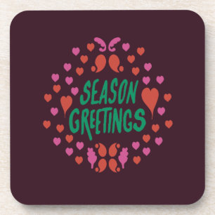 Season greetings in green handwriting with hearts coaster