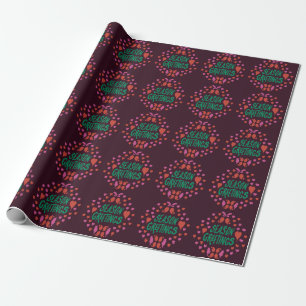 Season greetings in green handwriting with hearts wrapping paper