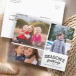 Seasons Greetings 3 Photo Collage Postcard<br><div class="desc">Stylish lovely clean light and simple modern horizontal Christmas postcard designed with text Season's Greetings on white and three photos. Replace the template images with your favourite photos and change all the template information on both sides with your own. For best results use high resolution images. To customise the size...</div>