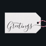 Season's Greetings Black White Minimalist Gift Tag<br><div class="desc">This minimalist and elegant gift tag features black Season's Greetings text on the front side and on the back side personalise it with your name or family name. The background is in white colour.</div>