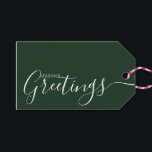Season's Greetings Green White Minimalist Gift Tags<br><div class="desc">This minimalist and elegant gift tag features white Season's Greetings text on the front side and on the back side personalise it with your name or family name. The background is in green colour.</div>