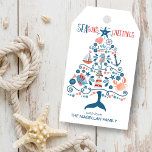 Seasons Greetings Nautical Beach Christmas Gift Tags<br><div class="desc">Beach inspired Christmas gift tags feature a pattern of tropical fish,  lighthouse,  whale tail,  seashell,  starfish,  crab,  sand dollar,  sailboat,  seahorse and captain's wheel in the shape of a Christmas tree with "SEAson's Greetings" in a cool nautical font. Original artwork KL Stock.</div>