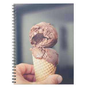 Selective focus photography of chocolate ice cream notebook