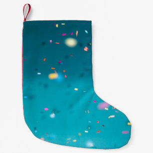 Selective focus photography of multicolored confet small christmas stocking