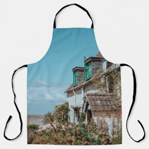 SELECTIVE FOCUS PHOTOGRAPHY OF WHITE AND BROWN CON APRON