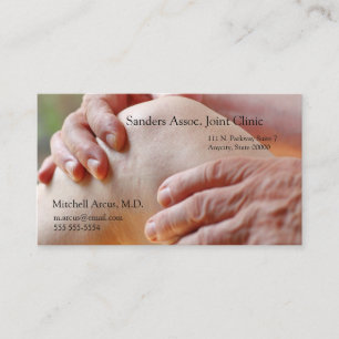 Senior examines an aching knee business card