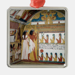 Sennedjem and his wife facing a naos metal tree decoration