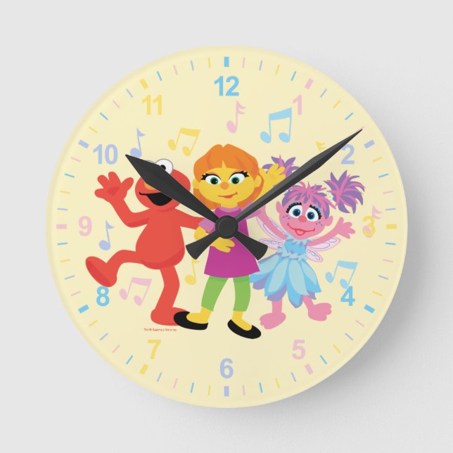 Sesame Street | Julia, Elmo & Abby Dancing Round Clock (Front)