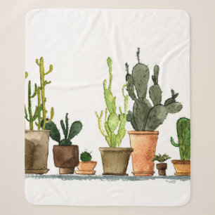 Seven hand drawn green watercolor cactus in brown sherpa blanket