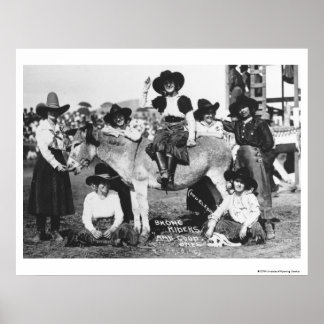 Seven rodeo cowgirls jokingly posing with a donkey poster