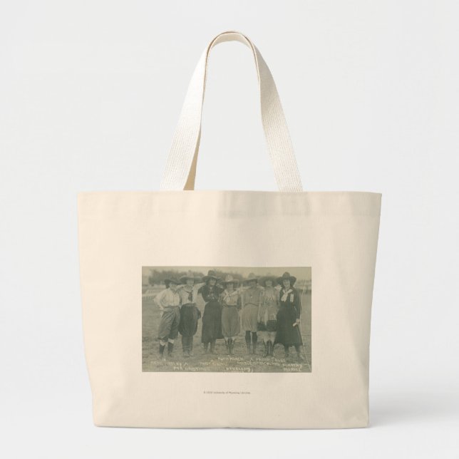 Seven rodeo cowgirls posing for a photograph. large tote bag (Front)
