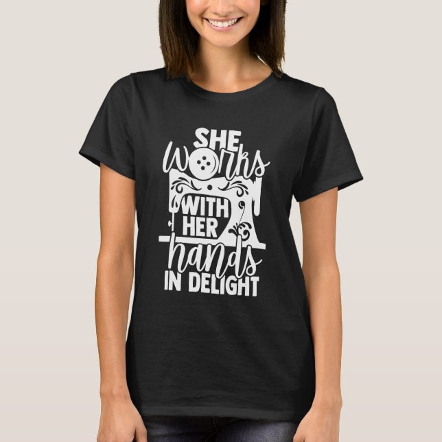 Sewing she works with her hands in delight T-Shirt (Front)