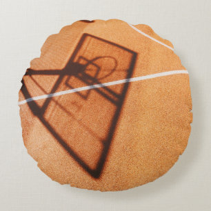 Shadow of basketball hoop round cushion
