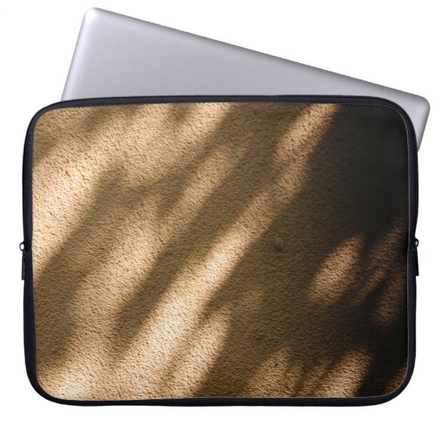 Shadow on brown carpeted floor laptop sleeve (Front)