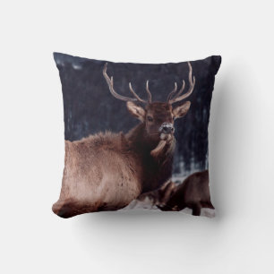 SHALLOW FOCUS PHOTO OF BROWN DEER CUSHION