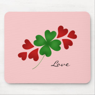 Shamrock and hearts on pink mouse pad