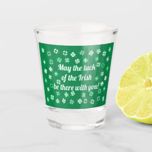 Shamrocks 4-leafed clovers on dark green shot glass