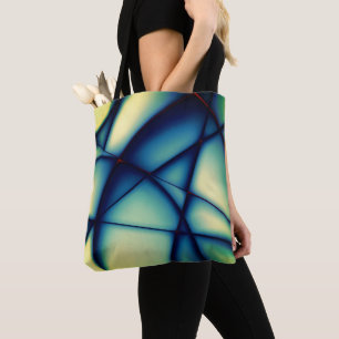 Shapeless cutouts raised, blue to 'avocado cream' tote bag