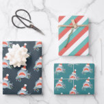 Shark Santa Claus Blue Christmas Holiday Wrapping Paper Sheet<br><div class="desc">This cute christmas holiday wrapping paper features a set of 3 different designs of wrapping papers. 1. a navy blue background with patterns of a shark with a santa hat and christmas lights. 2. a white background with red and sky blue diagnol stripes. 3. a teal background with patterns of...</div>