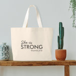She is Strong | Proverbs 31:25 Christian Faith Large Tote Bag<br><div class="desc">Simple,  stylish christian scripture quote art tote bag with bible verse "She is Strong - Proverbs 31:25" in modern minimalist typography in off black. This trendy,  modern faith design is the perfect gift and fashion statement. | #christian #religion #scripture #faith #bible #jesus #bethelight</div>