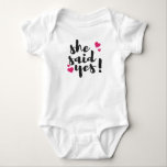 She Said Yes! Engagement Celebration – Romantic  Baby Bodysuit<br><div class="desc">Celebrate one of life’s most unforgettable moments with this beautiful “She Said Yes!” text-based design. Perfect for engagement announcements, bridal celebrations, and wedding planning excitement, this romantic statement captures the joy of saying yes to forever. Ideal for T-shirts, mugs, invitations, stickers, and engagement party décor, this design makes a thoughtful...</div>