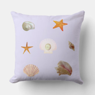 Shells, sea stars, & pearl on light periwinkle cushion