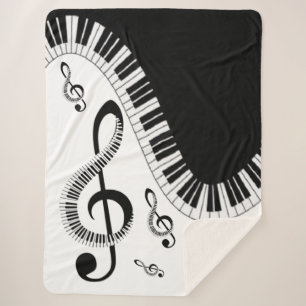 Sherpa manta with piano and musical notes blanket