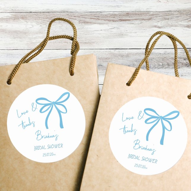She's tying the knot blue ribbon bow favour classic round sticker (She's tying the knot blue ribbon bow bridal shower thank you favor classic round sticker)