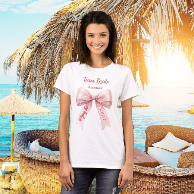 She's tying the knot pink bow Team Bride T-Shirt (Creator Uploaded)