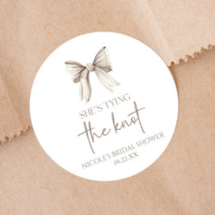 She's Tying The Knot White Bow Bridal Shower Classic Round Sticker