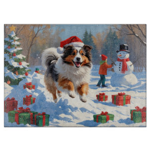Shetland Sheepdog Running Snow With Christmas Hat Cutting Board