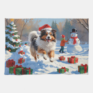 Shetland Sheepdog Running Snow With Christmas Hat Tea Towel
