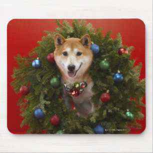 Shiba Inu dog sitting in Christmas wreath Mouse Pad