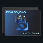 Shiny Blue Chanukkah Menorah<br><div class="desc">A modernistic,  metallic,  blue Chanukkah menorah,  featuring a lion in silhouette,  against a dark,  night-like background. All nine of the candles are lit. Hebrew text reading "Chag Chanukkah Sameach" (Happy Hanukkah) also appears in glowing blue and white. Add your own additional text.</div>